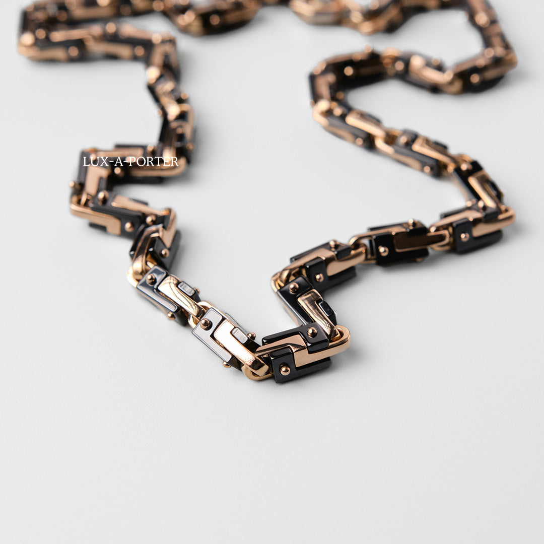 Luxury chain belt with rose gold and black design on a light gray background Baraka Cyborg Ceramic Chain GC245151ROCN Pre-Owned